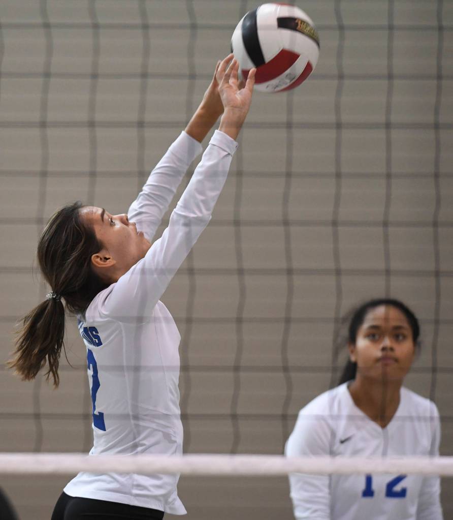 Thunder Mountains Amy Schoonover sets the ball up against Mt. Edgecumbe at the Volleyball Jamboree at Juneau-Douglas High School: Yadaa.at Kalé on Friday, Aug. 30, 2019. (Michael Penn | Juneau Empire)