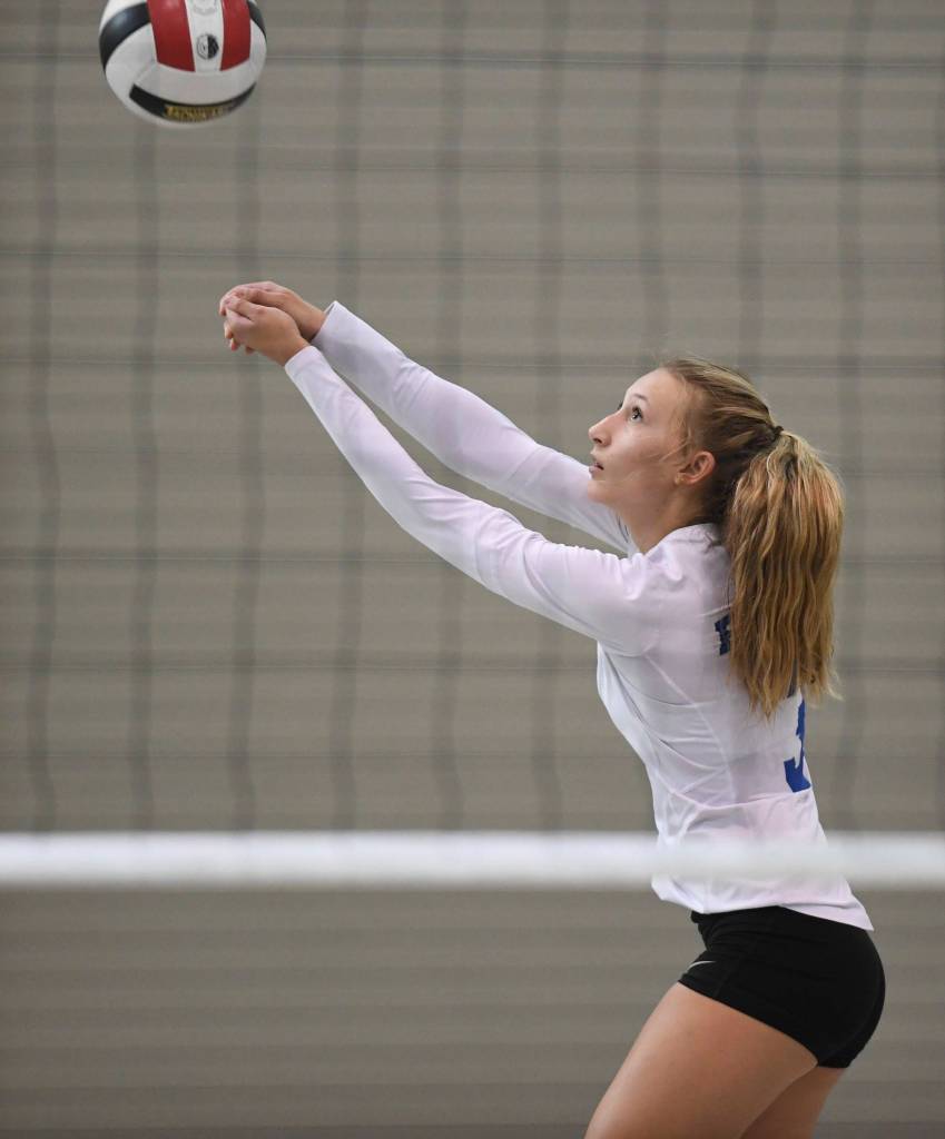 Thunder Mountains Lily Smith bumps the ball up against Mt. Edgecumbe at the Volleyball Jamboree at Juneau-Douglas High School: Yadaa.at Kalé on Friday, Aug. 30, 2019. (Michael Penn | Juneau Empire)
