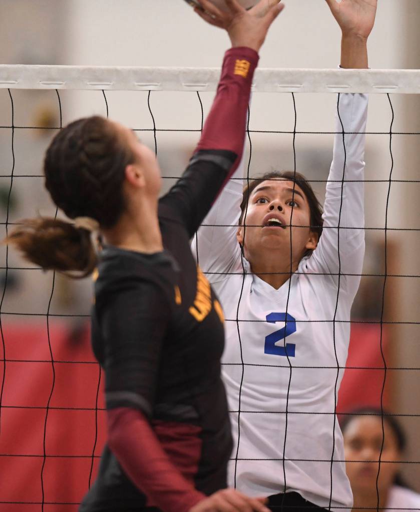 Thunder Mountains Amy Schoonover attempts a block against Mt. Edgecumbe at the Volleyball Jamboree at Juneau-Douglas High School: Yadaa.at Kalé on Friday, Aug. 30, 2019. (Michael Penn | Juneau Empire)