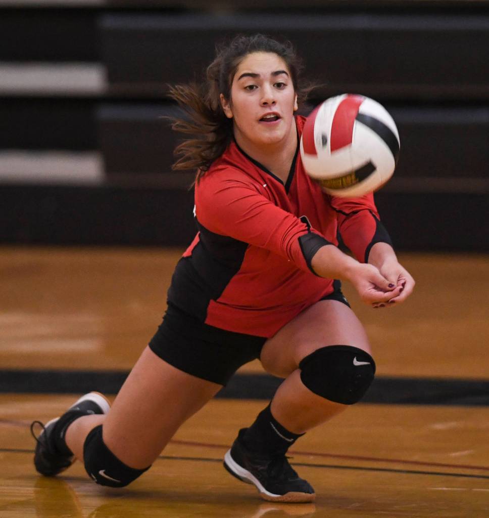Juneau-Douglas Paige Adams bumps the ball up against Thunder Mountain at the Volleyball Jamboree at Juneau-Douglas High School: Yadaa.at Kalé on Friday, Aug. 30, 2019. (Michael Penn | Juneau Empire)