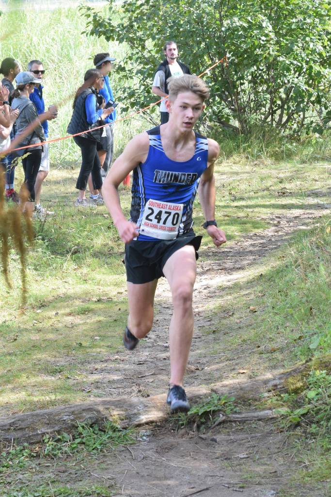 Thunder Mountain High Schools Tucker Kelly runs in the Capital City Invitational at Sandy Beach on Saturday, Aug. 31, 2019. (Nolin Ainsworth | Juneau Empire)