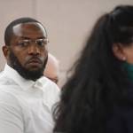 Laron Carlton Graham listens to his attorney, Natasha Norris, in Juneau Superior Court on Tuesday, Sept. 3, 2019, during his trial on two counts of first-degree murder for the Nov. 14, 2015 shooting deaths of 36-year-old Robert H. Meireis and 34-year-old Elizabeth K. Tonsmeire. (Michael Penn | Juneau Empire)