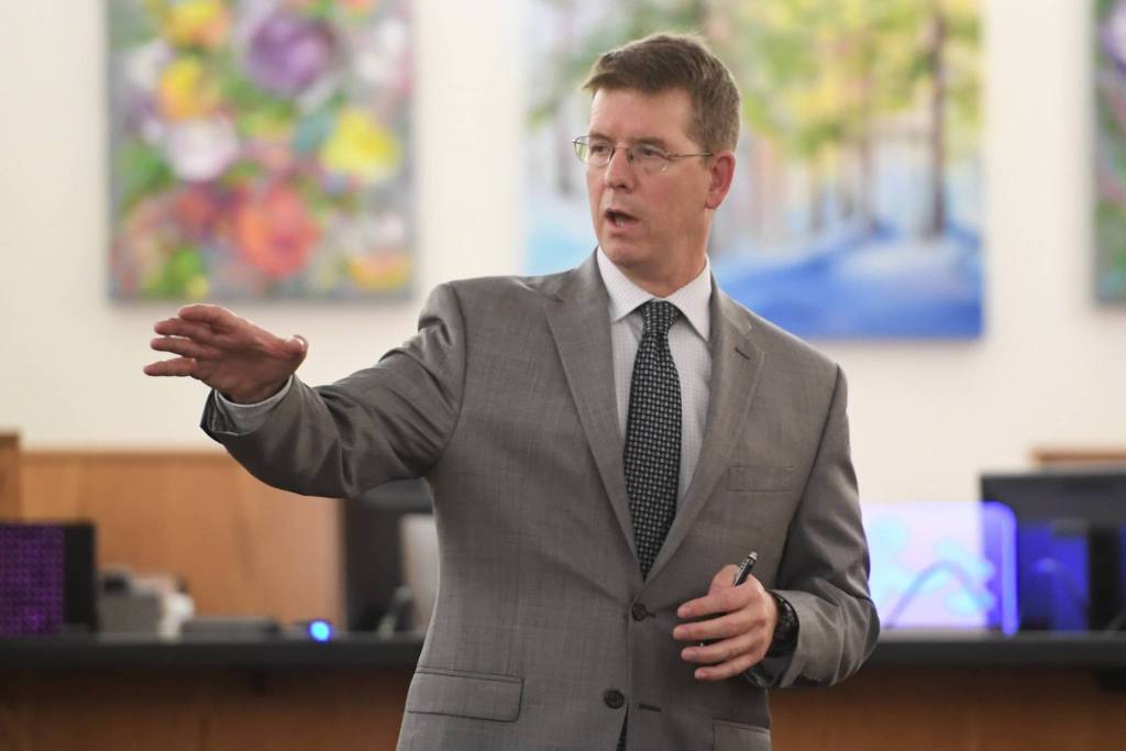 John Darnall, attorney from the Office of Special Prosecutions, gives an opening statement and motions towards Laron Carlton Graham in Juneau Superior Court on Tuesday, Sept. 3, 2019, during Grahams trial on two counts of first-degree murder for the Nov. 14, 2015 shooting deaths of 36-year-old Robert H. Meireis and 34-year-old Elizabeth K. Tonsmeire. (Michael Penn | Juneau Empire)