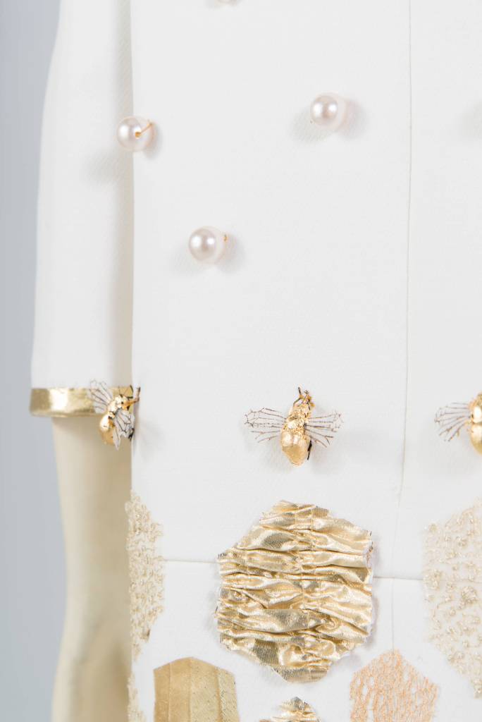 A dress made by Shea Zahedi that will soon be show in New York City incorporates handmade handmade lamé bees. (Courtesy Photo | Erica J. Mitchell)