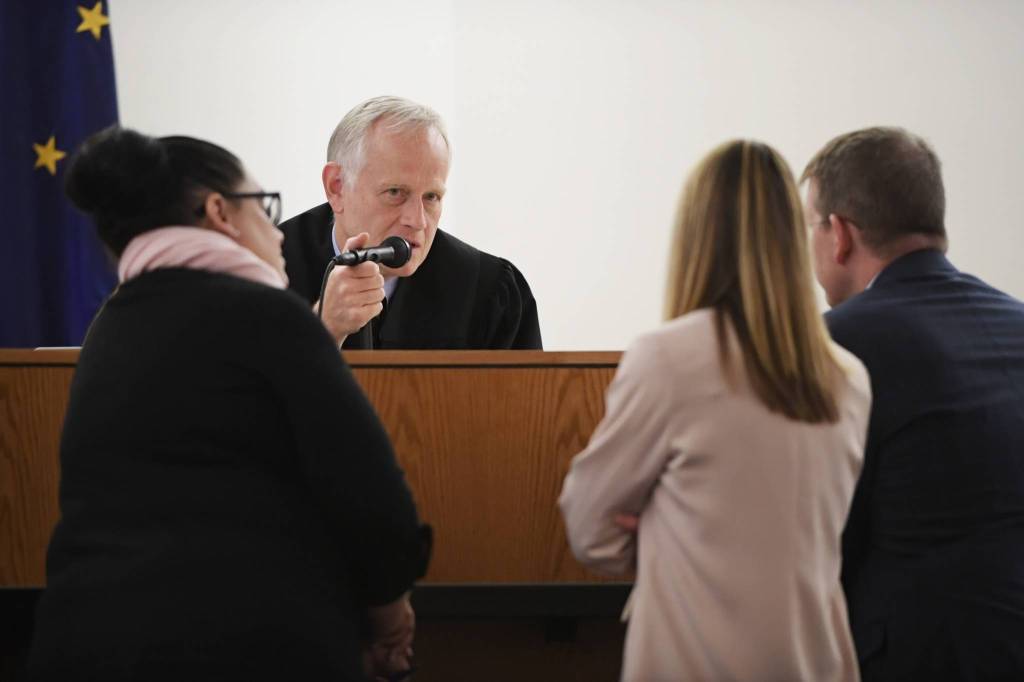 Juneau Superior Court Judge Philip Pallenberg, center, speaks with Defense Attorney Natasha Norris, left, Assistant Attorney General Kaci Schroeder and Prosecuting Attorney John Darnall, from the Office of Special Prosecutions, in Juneau Superior Court on Wednesday, Sept. 4, 2019, during the trial of Laron Carlton Graham on two counts of first-degree murder for the November 2015 shooting deaths of 36-year-old Robert H. Meireis and 34-year-old Elizabeth K. Tonsmeire. (Michael Penn | Juneau Empire)