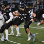 Juneaus Noah Chambers follows a block by teammate Danny Isaak against Wasilla in the second quarter at Adair-Kennedy Memorial Field on Friday, Sept. 6, 2019. Juneau won 63-0. (Michael Penn | Juneau Empire)