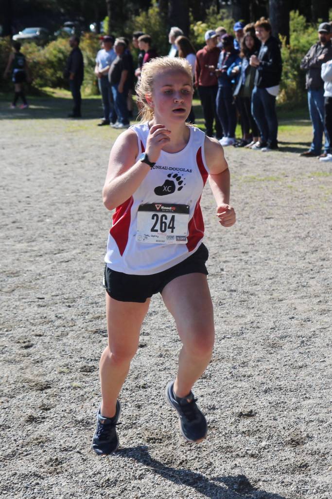 Juneau-Douglas High School: Yadaat.at Kales Shelby York runs along the beach while racing in the Petersburg Invitational cross country meet at Sandy Beach Park on Saturday, Sept. 7, 2019. (Brian Varela | Petersburg Pilot)