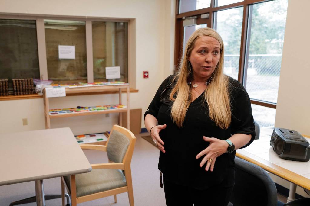 Dacia Davis, program manager for Juneau Housing First Collaboratives Forget-Me-Not Manor, gives a tour of the facility on Wednesday, Sept. 11, 2019. It is the two-year anniversary of the project that provides housing and support services to chronically homeless adults who have struggled with alcohol and are high utilizers of emergency services within the City and Borough of Juneau. Phase II to build another 32 apartments is currently underway and will open late next year. (Michael Penn | Juneau Empire)