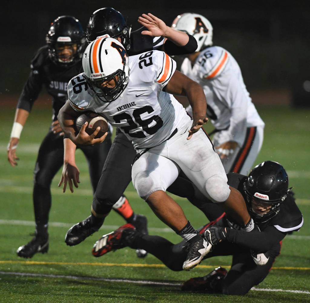 Juneaus Dawson Hickok tackles Wests Elias Roehl-Paredes in the second quarter at Adair-Kennedy Memorial Field on Friday, Sept. 13, 2019. West won 43-14. (Michael Penn | Juneau Empire)