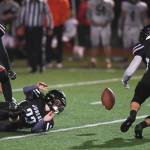 Juneaus Ali Beya, right, recovers a fumble by teammate James Connally in the third quarter against West at Adair-Kennedy Memorial Field on Friday, Sept. 13, 2019. West won 43-14. (Michael Penn | Juneau Empire)