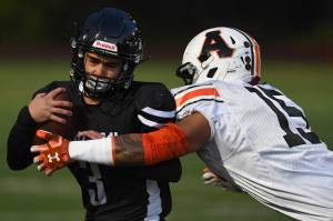 Juneaus Gaby Soto is tackled by Wests Dhar Montalbo in the first quarter at Adair-Kennedy Memorial Field on Friday, Sept. 13, 2019. West won 43-14. (Michael Penn | Juneau Empire)