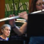 Nancy Nash, on piano, left, and Sally Schlichting, on flute, rehearse for the Con Brio Chamber Series concert of music by women composers at Northern Light United Church on Sept. 17, 2019. (Michael Penn | Juneau Empire)