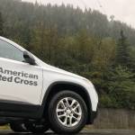 A Red Cross vehicle waits at the scene of a search and rescue for a stranded hiker on Mount Roberts. (Michael Penn | Juneau Empire)