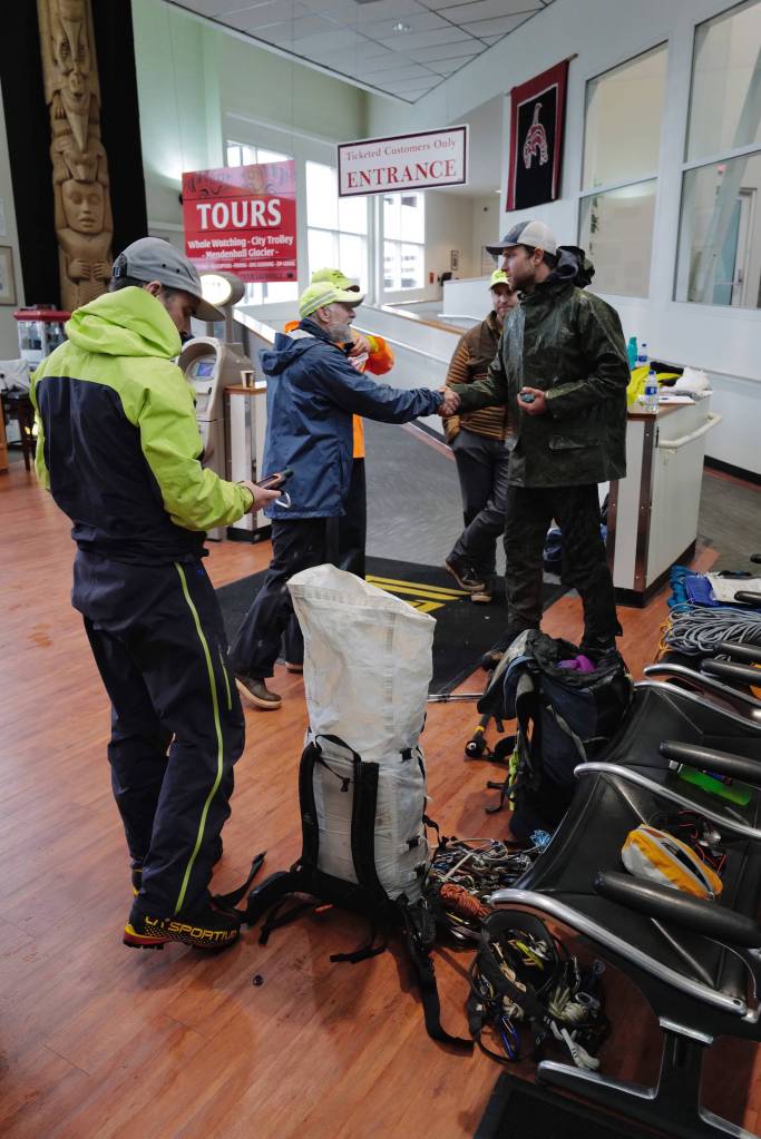 Juneau Mountain Rescue personnel gather at the Mount Roberts Tramway to find a lost person on Mount Roberts on Friday, Sept. 20, 2019. (Michael Penn | Juneau Empire)