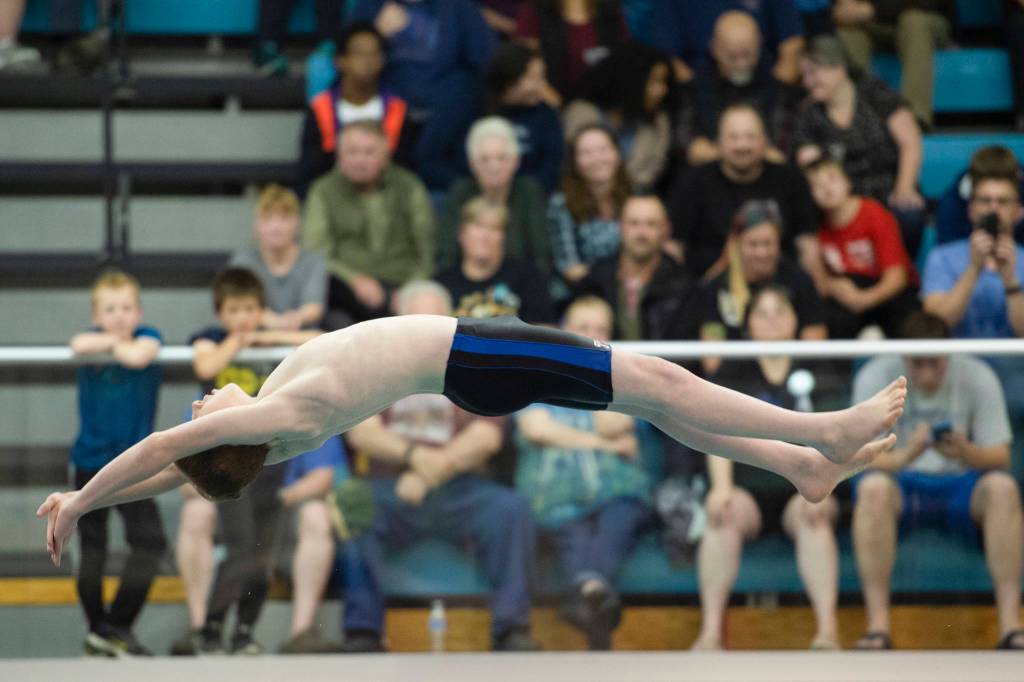 Thunder Mountains Samuel Kiessling competes in the diving event at the Juneau Invitational Swim Meet at the Dimond Park Aquatic Center on Friday, Sept. 20, 2019. (Michael Penn | Juneau Empire)