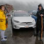 Cheryl and Henry Jebe pose with their Tesla Model X as Juneau residents meet for the sixth annual Electric Vehicle Juneau Roundup on Saturday, Sept. 21, 2019. (Michael Penn | Juneau Empire)