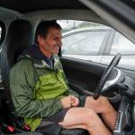 Arnold Liebelt tries out an electric Smart Car for size as Juneau residents meet for the Sixth Annual Electric Vehicle Juneau Roundup on Saturday, Sept. 21, 2019. (Michael Penn | Juneau Empire)