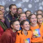 The Very Hungry Caterpillar team poses at a photo booth inside Elizabeth Peratrovich Hall prior to the running of the 35th annual Only Fools Run at Midnight. (Nolin Ainsworth | Juneau Empire)