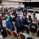 The original sculpin hat, right, and a replica are unveiled during a welcoming ceremony at Elizabeth Peratrovich Hall on Wednesday, Sept. 25, 2019. The original hat was collected from the Kiks.ádi Clan in Sitka in 1984. The Smithsonian Institution used a 3D digitization process to document the hat and constructed the hat using traditional materials. (Michael Penn | Juneau Empire)