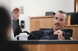 Juneau Police Department Officer Ronald Shriver answers questions on the witness stand from defense attorney Natasha Norris in Juneau Superior Court on Tuesday, Sept. 24, 2019, during Grahams trial. Graham is facing two counts of first-degree murder for the November 2015 shooting deaths of 36-year-old Robert H. Meireis and 34-year-old Elizabeth K. Tonsmeire. Shriver was a Department of Corrections officer working at Lemon Creek Correctional Center when Graham was housed there in 2016. (Michael Penn | Juneau Empire)