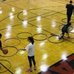 Campers dribble through hula hoops at the I Did, You Can! basketball camp at Juneau-Douglas High School: Yadaat.at Kale on Sunday, Sept. 29, 2019. (Courtesy Photo | Janette Gagnon)