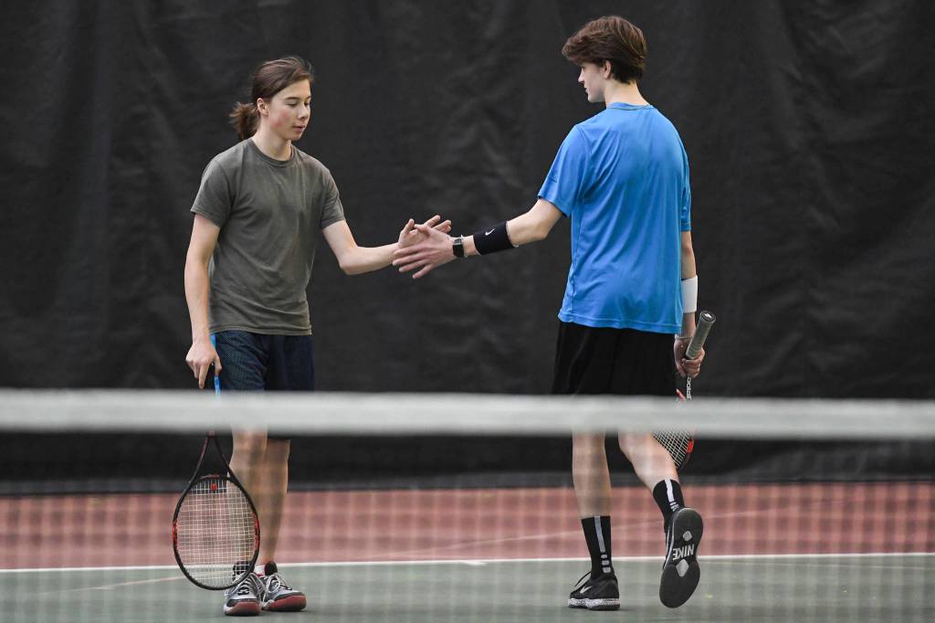 Liam Penn and Callan Smith celebrate a point against William Smoker and Will Rehfeldt in a boys doubles semifinal during the Region V Tennis Tournament at The Alaska Club/JRC on Saturday, Sept. 28, 2019. Smoker/Rehfeldt won 7-6, 6-2. (Michael Penn | Juneau Empire)