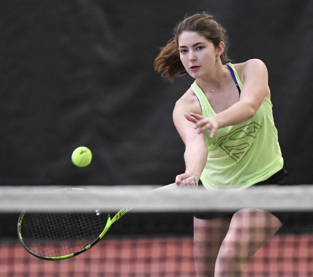 Olivia Moore returns a forehand against Anna Dale in the girl singles final during the Region V Tennis Tournament at The Alaska Club/JRC on Sunday, Sept. 29, 2019. Dale won 6-4, 6-1. (Michael Penn | Juneau Empire)