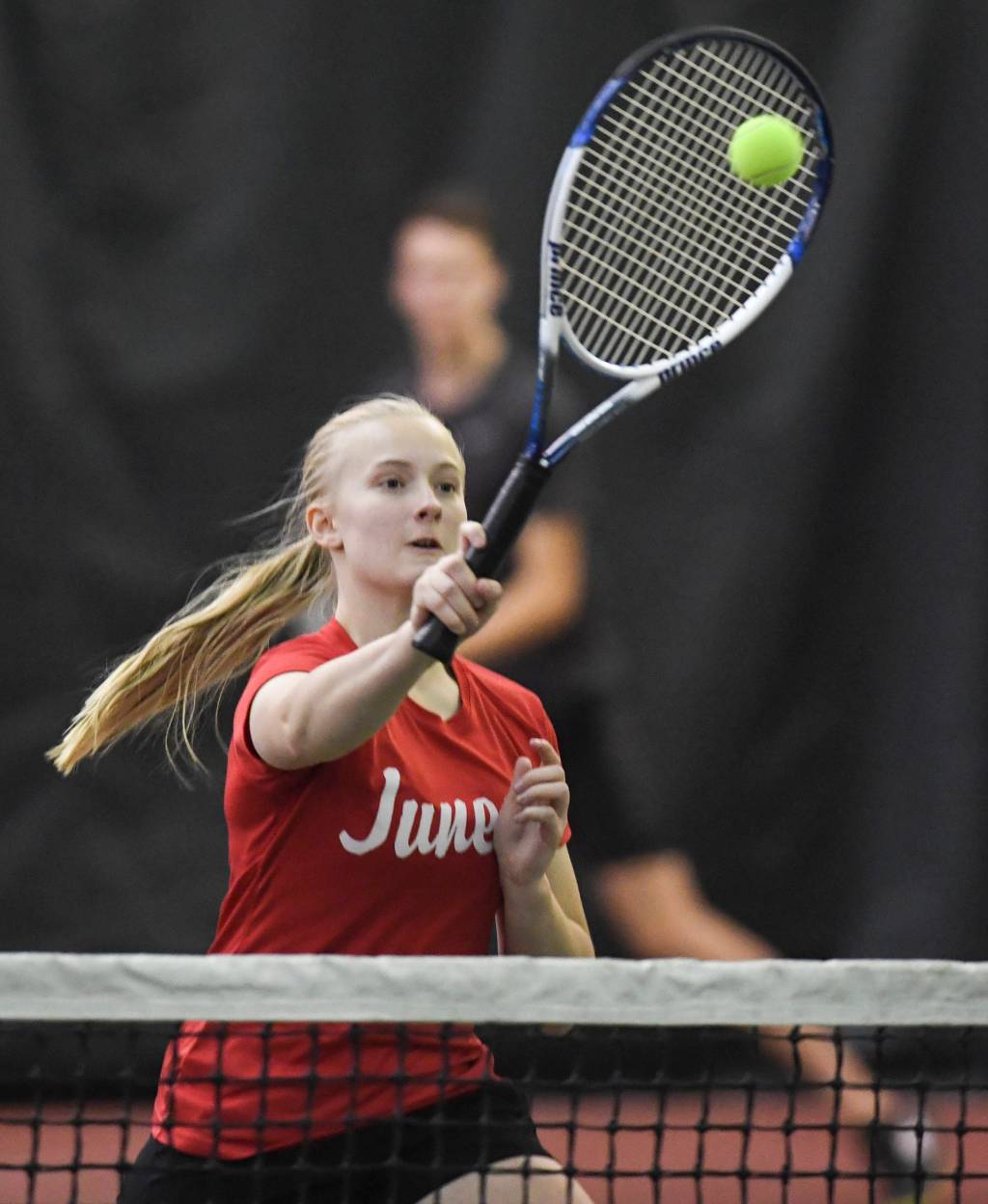 Anna Dale returns a volley during the mixed doubles final with partner Kevin Kooistra against Olivia Moore and William Smoker during the Region V Tennis Tournament at The Alaska Club/JRC on Sunday, Sept. 29, 2019. Dale/Kooistra won 6-0, 6-2. (Michael Penn | Juneau Empire)