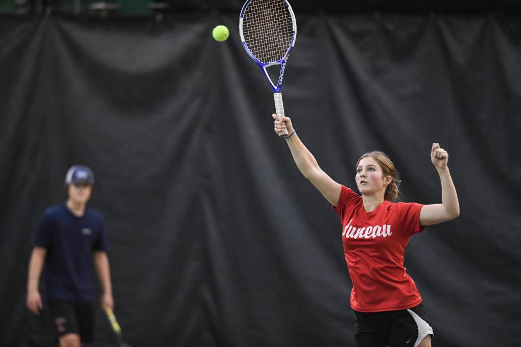 Gloria Bixby hits an overhead in the mix doubles consolation final with partner Reed Loree against Katie Pikul and Liam Penn during the Region V Tennis Tournament at The Alaska Club/JRC on Sunday, Sept. 29, 2019. Pikul/Penn won 8-0. (Michael Penn | Juneau Empire)