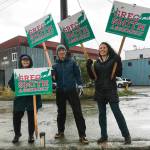 Greg Smith and some of his supporters wave signs in the intersection of Egan Drive and Douglas Bridge. Voting is from 7 a.m. to 8 p.m. on Tuesday, Oct. 1, 2019. (Michael S. Lockett | Juneau Empire)