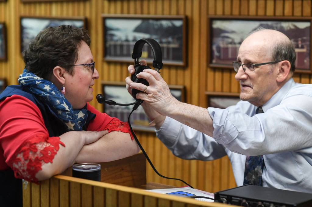 Pete Carran, of KINY, interviews City Clerk Beth McEwen before election results come in at City Hall on Tuesday, Oct. 1, 2019. (Michael Penn | Juneau Empire)