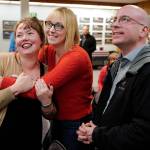 Assembly members Alicia Hughes-Skandijs, left, Carole Triem, center, and Wade Bryson watch results come in at City Hall on Tuesday, Oct. 1, 2019. (Michael Penn | Juneau Empire)