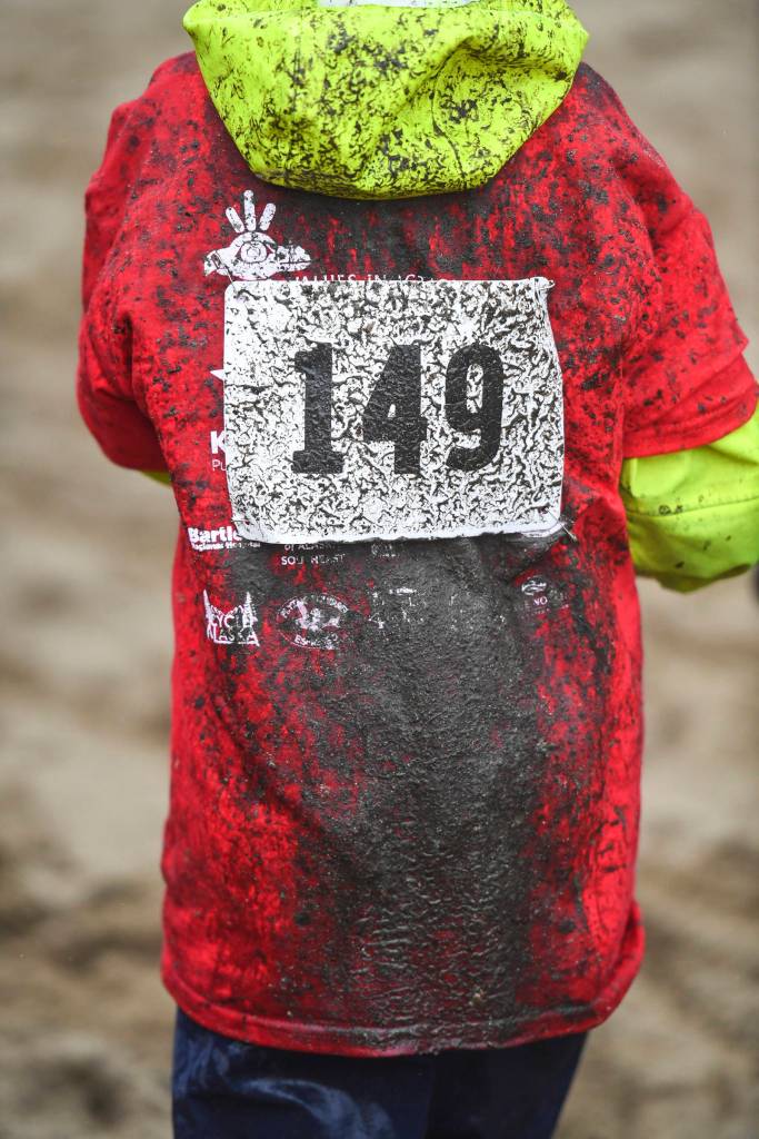 Mud splatters the backside of a rider at the Douglas Dirt Derby Youth Bike Race for 5 to 7-year-olds at Savikko Park and the Treadwell Historic Trail on Saturday, Oct. 5, 2019. The event was organized by the Juneau Freewheelers Bicycle Club. (Michael Penn | Juneau Empire)