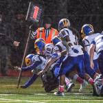 Juneaus Wallace Adams is chase out of bound by Bartlett after a botched field goal attempt at Adair-Kennedy Memorial Field on Saturday, Oct. 5, 2019. Juneau won 67-24. (Michael Penn | Juneau Empire)