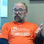 Terry White talks during an interview on Thursday, Oct. 10, 2019, about living with multiple myeloma and looking forward to an expedition in Patagonia as a fundraiser for research. (Michael Penn | Juneau Empire)