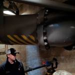 Scott Simonson, a senior wastewater collection officers for the city, stands underneath an outgoing wastewater pipe at theOuter Drive Pumping Station downtown on Friday, Oct. 11, 2019. The three pumps were overwhelmed during last weekends storm and caused a backup of sewage into the Mayor Bill Overstreet Park utilities building. (Michael Penn | Juneau Empire)