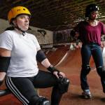 Shabadrang Khalsa, left, and Jennifer Gross, who skate with the Juneau Rollergirls, talk about what rollerskating means to them during a break getting their daily skate in at the Pipeline Skate Park on Friday, Oct. 11, 2019. The two are skating every day as part of a challenge to every day for a year. (Michael Penn | Juneau Empire)