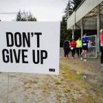Juneau residents head for the starting line of the annual community mental health run, the Extra Tough 5K & 1 Mile Run, on Saturday, Oct. 12, 2019, at Riverbend Elementary School. The run is sponsored by National Alliance on Mental Illness (NAMI) Juneau. (Michael Penn | Juneau Empire)
