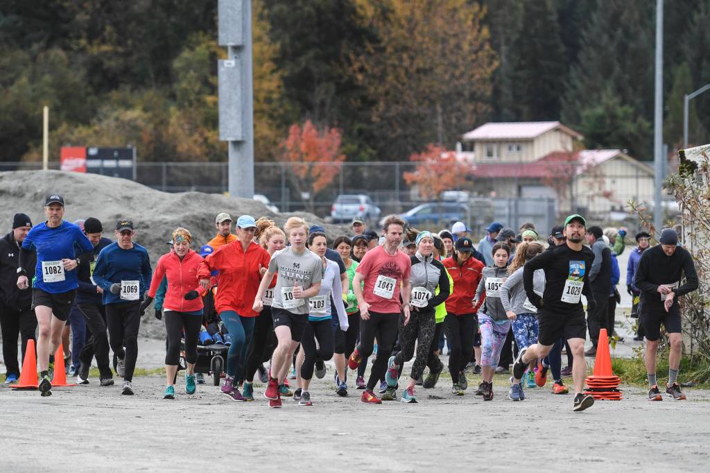 Juneau residents start the annual community mental health run, the Extra Tough 5K & 1 Mile Run, on Saturday, Oct. 12, 2019, at Riverbend Elementary School. The run is sponsored by National Alliance on Mental Illness (NAMI) Juneau. (Michael Penn | Juneau Empire)