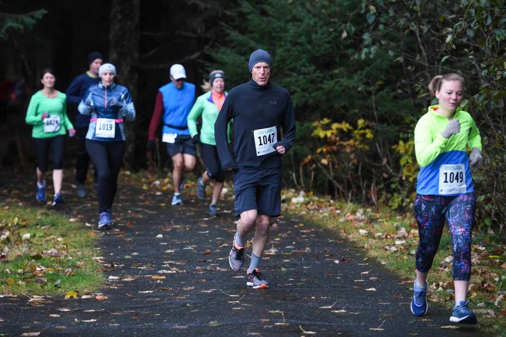 Juneau residents participate in the annual community mental health run, the Extra Tough 5K & 1 Mile Run, on Saturday, Oct. 12, 2019, starting at Riverbend Elementary School. The run is sponsored by National Alliance on Mental Illness (NAMI) Juneau. (Michael Penn | Juneau Empire)