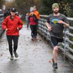 Juneau residents participate in the annual community mental health run, the Extra Tough 5K & 1 Mile Run, on Saturday, Oct. 12, 2019, starting at Riverbend Elementary School. The run is sponsored by National Alliance on Mental Illness (NAMI) Juneau. (Michael Penn | Juneau Empire)