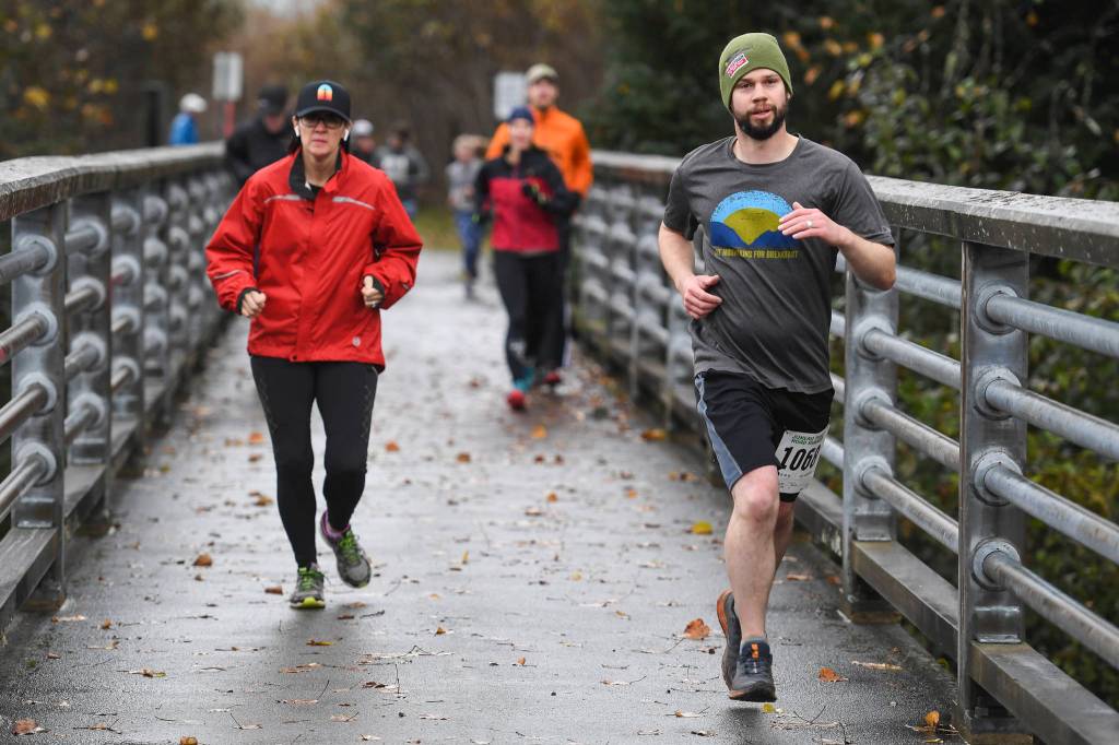 Juneau residents participate in the annual community mental health run, the Extra Tough 5K & 1 Mile Run, on Saturday, Oct. 12, 2019, starting at Riverbend Elementary School. The run is sponsored by National Alliance on Mental Illness (NAMI) Juneau. (Michael Penn | Juneau Empire)
