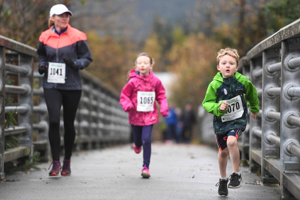 Juneau residents participate in the annual community mental health run, the Extra Tough 5K & 1 Mile Run, on Saturday, Oct. 12, 2019, starting at Riverbend Elementary School. The run is sponsored by National Alliance on Mental Illness (NAMI) Juneau. (Michael Penn | Juneau Empire)