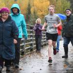 Finn Kesey runs in the annual community mental health run, the Extra Tough 5K & 1 Mile Run, on Saturday, Oct. 12, 2019, at Riverbend Elementary School. The run is sponsored by National Alliance on Mental Illness (NAMI) Juneau. (Michael Penn | Juneau Empire)