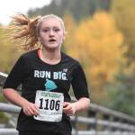 Lindsay McTague participates in the annual community mental health run, the Extra Tough 5K & 1 Mile Run, on Saturday, Oct. 12, 2019, starting at Riverbend Elementary School. The run is sponsored by National Alliance on Mental Illness (NAMI) Juneau. (Michael Penn | Juneau Empire)