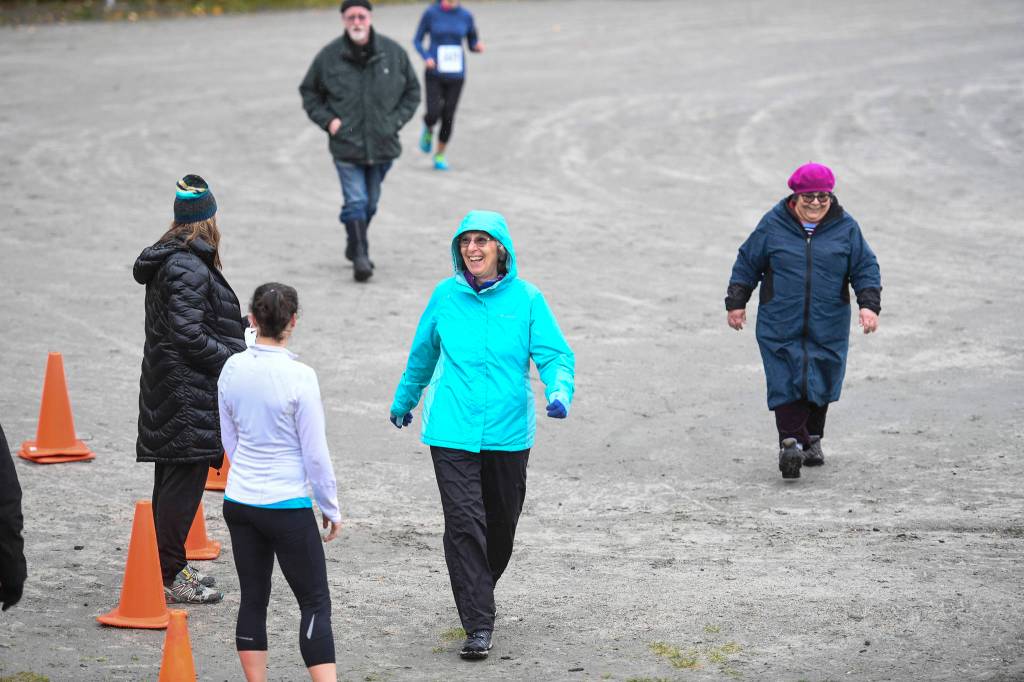 Juneau residents participate in the annual community mental health run, the Extra Tough 5K & 1 Mile Run, on Saturday, Oct. 12, 2019, starting at Riverbend Elementary School. The run is sponsored by National Alliance on Mental Illness (NAMI) Juneau. (Michael Penn | Juneau Empire)