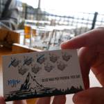 John Loverink shows the card Forbidden Peak Brewery uses to track customers consumption, during the brewerys grand opening, Saturday, Oct. 12, 2019. State law limits breweries to selling 36 ounces of beer per person per day in tasting rooms. (Ben Hohenstatt | Juneau Empire)