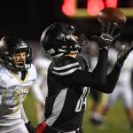 Juneaus Dawson Hickok catches a long pass against South Anchorages Aidan Ohlson at Adair-Kennedy Memorial Field on Saturday, Oct. 13, 2019. (Michael Penn | Juneau Empire)