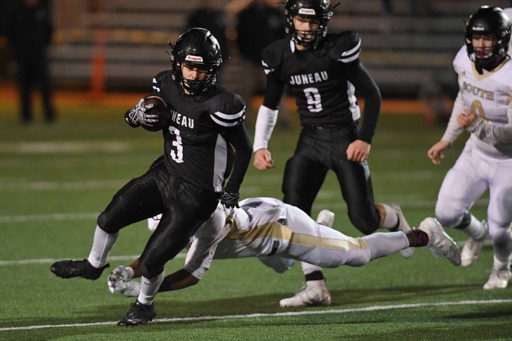 Juneaus Gaby Soto runs against South Anchorages at Adair-Kennedy Memorial Field on Saturday, Oct. 12, 2019. (Michael Penn | Juneau Empire)