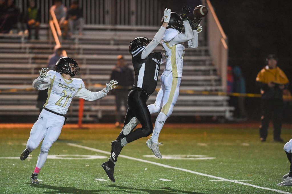 South Anchorages Aidan Ohlson intercepts a pass meant for Juneaus Garrett Bryant at Adair-Kennedy Memorial Field on Saturday, Oct. 12, 2019. South Anchorage won 54-14. (Michael Penn | Juneau Empire)